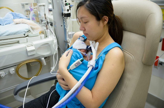 Baby crowned ‘Kangaroo Care’ champion at KKH after parents set record 48 hours of skin-to-skin contact