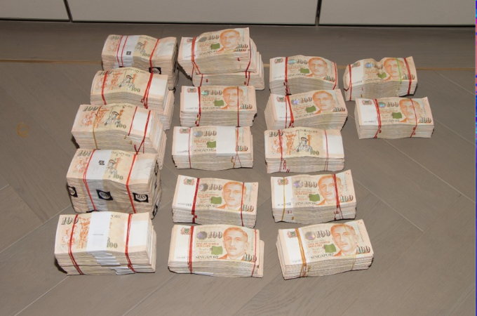 Singapore police seize S$1 billion worth of properties, cars & luxury goods, arrest 10 foreigners in islandwide money laundering raid